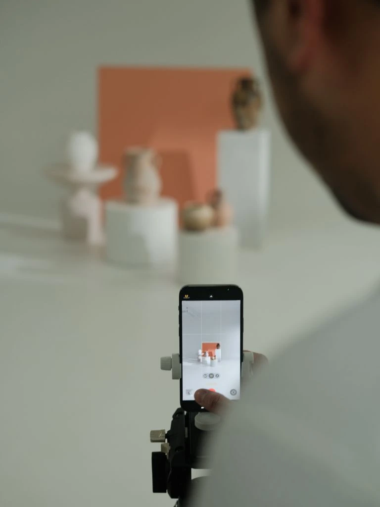 Customer signing a job completion on a phone at a doorstep